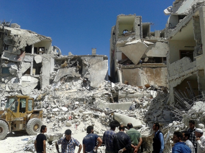 Houses in Kafr Hamreh, a town in northern Aleppo governorate, that were destroyed during an apparent ballistic missile attack on June 2, 2013. The attack killed at least 29 people, including 8 children. © 2013 Human Rights Watch